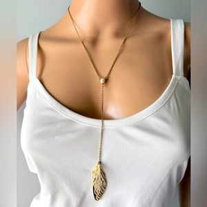 NWOT Jessica Simpson Gold Dragonfly Wings Necklace with pearl detail.